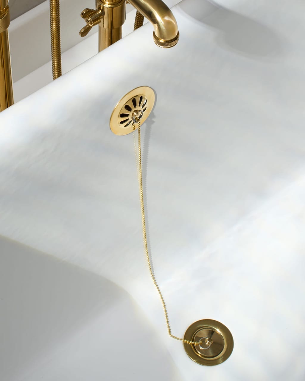 Finishing Details Bathtub Overflow2 — photography by Shawn Willis for Waterworks